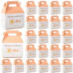 a dozen orange and white boxes with sunflowers on them