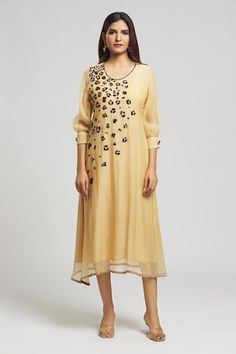 Beige kurta with sequin and bead embroidered floral patterns. - Aza Fashions Designer Embellished Kurta For Spring, Spring Designer Embellished Kurta, Womens Tunics, Embroidered Silk, Hand Spinning, Aza Fashion, Floral Pattern, Silk, Floral