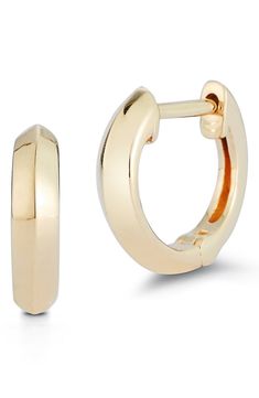 Soft knife edges highlight the shine and bring understated visual interest to dainty huggie hoops crafted out of bright 14-karat gold. 14k gold Imported Formal Huggie Earrings, Timeless Small Hoop 14k Gold Huggie Earrings, Timeless 14k Gold Small Hoop Huggie Earrings, 14k Gold Huggie Earrings With Lever Back, Formal Small Hoop Huggie Earrings With Lever Back, Formal Huggie Earrings With Lever Back, Formal Small Hoop Huggie Earrings, Polished Finish Huggie Earrings In Fine Jewelry, Polished Small Hoop Huggie Earrings In Yellow Gold