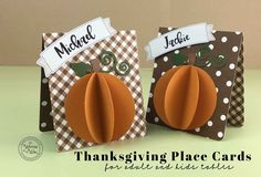 two thanksgiving place cards with pumpkins on them