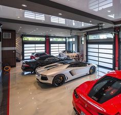 a garage filled with lots of different types of cars