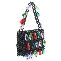 a black purse with lots of colorful beads