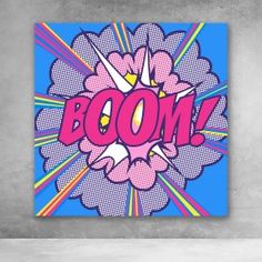 the word boom on a blue background with pink and yellow rays coming out of it