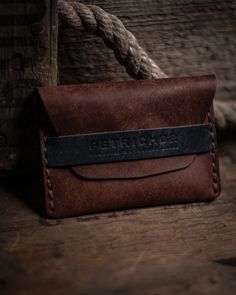 A meticulously made, modern, minimalistic cardholder. Lightweight and built to last; The Quimby Flap Cardholder is crafted using the best Italian Full Grain Leather from the Carlo Badalassi Tannery. Over time, a beautiful dark patina will develop further enhancing its vintage look to this timeless design. The wallet will hold up to 8 cards comfortably. Custom monogram available on the backside of the wallet. Minimalist Trifold Card Holder For Everyday, Minimalist Bifold Coin Purse As Gift, Minimalist Trifold Wallet For Everyday Use, Minimalist Wallets With Interior Card Slots As Gift, Minimalist Rectangular Wallets For Everyday Use, Minimalist Card Holder Gift, Minimalist Rectangular Wallet For Everyday Use, Minimalist Brown Wallets As Gift, Minimalist Brown Trifold Wallet For Everyday