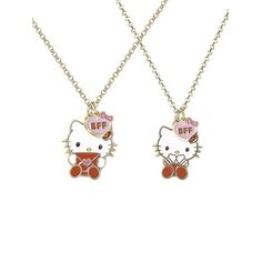 two necklaces with hello kitty charms hanging from the same chain, one on each side