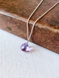 Amethyst Necklace, February Birthstone, Purple Amethyst Teardrop Pendant, Minimalist Jewelry in Gold or Silver, Delicate Gift for February This simple and classy necklace features a micro faceted purple Amethyst teardrop wire wrapped to a dainty chain in your choice of gold filled or sterling silver. This minimalist necklace is ideal for every day wear, and it makes a wonderful gift for a girl born in February, as this is their birthstone. Popular choice for bridesmaids necklaces, this necklace Lavender Gemstone Teardrop Jewelry, Teardrop Lavender Gemstone Jewelry, Lavender Teardrop Gemstone Jewelry, Dainty Teardrop Gemstone Charm Necklaces, Amethyst Teardrop Pendant For Jewelry Making, Teardrop Amethyst Pendant For Jewelry Making, Dainty Teardrop Gemstone Charm Necklace, Adjustable Teardrop Crystal Necklace With Gemstone, Lavender Gemstone Drop Jewelry