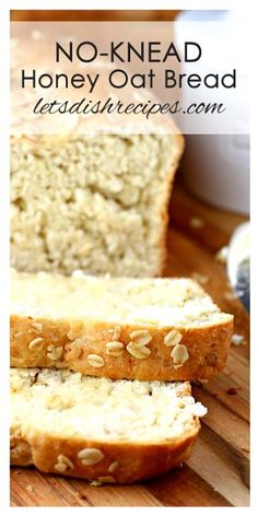 no knead honey oat bread is cut in half and sitting on a cutting board