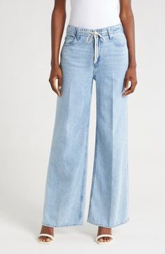 A tie at the high waist adds weekend-ready style to full-length, casual-chic wide-leg jeans made from soft, nicely draped nonstretch denim. 30 1/2" inseam; 22" leg opening; 11 1/2" front rise; 16" back rise (size 29) Tie waist Five-pocket style 60% cotton, 40% lyocell Machine wash, tumble dry Imported Versatile Summer Flare Jeans With Relaxed Fit, Summer Versatile Relaxed Fit Flare Jeans, Light Wash Bottoms For Fall Workwear, Fall Light Wash Workwear Bottoms, Elevated Casual Wide Leg Bottoms, Fall Workwear Light Wash Bottoms, Chic Light Wash Relaxed Fit Flare Jeans, Chic Relaxed Fit Light Wash Flare Jeans, Versatile High Rise Summer Flare Jeans