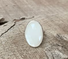 Large Oval Faceted White Moonstone Sterling Silver Ring | June Birthstone | Zodiac Jewelry | Moonstone Ring | Witcy | White Sparkly Gemstone by GildedBug on Etsy Large Oval White Moonstone Ring, White Oval Moonstone Ring With Large Stone, White Oval Faceted Ring, Silver Faceted Oval Moonstone Ring, White Oval Crystal Ring With Large Stone, Moonstone Ring Sterling Silver, White Moonstone, Zodiac Jewelry, June Birthstone