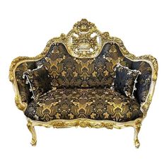 an ornately decorated couch with gold trimming