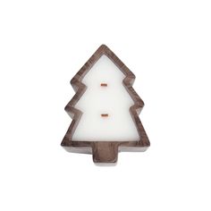 a candle that is shaped like a christmas tree