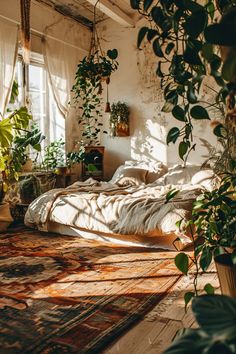 a bedroom with plants and rugs in it