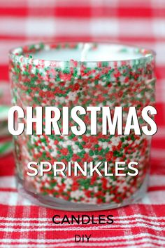 christmas sprinkles candle holder on a red and white checkered tablecloth