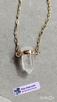 Necklace on golden chain with one stone pendant in white color Everyday Minimalist Gold Crystal Necklace, Delicate Gold Necklace With Crystal, Delicate Gold Crystal Necklace, Elegant Clear Necklaces With Adjustable Chain, White Minimalist Crystal Necklace With Clavicle Chain, Minimalist White Crystal Jewelry, Delicate Crystal Chain Necklace, Minimalist Gemstone Pendant Crystal Necklace, Clear Quartz Gemstone Necklace