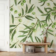 an olive tree wallpaper in a living room with a bench and vase on the floor