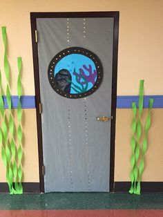 a door decorated to look like an underwater scene