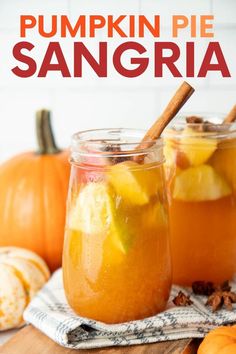 two mason jars filled with pumpkin pie sangria