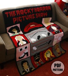 a couch with a blanket on top of it that says the rocky horror picture show