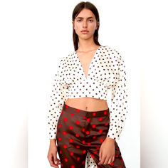 V-Neck Crop Top Featuring Long Cuffed Sleeves, A Back Vent And Tie Detail At The Hem. Chic V-neck Polka Dot Blouse, Zara Long Sleeve Polka Dot Top, Chic Polka Dot Blouse By Zara, Zara Chic Polka Dot Blouse, Chic Zara Polka Dot Blouse, Polka Dot V-neck Blouse For Day Out, Neck Crop Top, Cuff Sleeves, Zara Tops