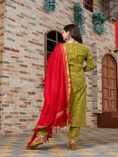 Green Round Neck floral printed straight kurta set with contrast red crush dupatta and straight pants. Neck: Round neck Sleeve Length: 3/4th Kurta Length: Calf Length Work Type: Gota Patti Fabric: Kurta & Botton - Cotton Dupatta - Crush Note: Dry Clean Only. The product will be shipped within 15-20 days of the order placed Measurements: Size Bust Waist Hip XS 34 28 36 Size 36 30 38 M 38 32 40 L 40 34 42 XL 42 36 44 2XL 44 38 46 3XL 46 40 48 4XL 48 42 50 5XL 50 44 52 Kalamkari Palazzo Set For Diwali, Festive Kalamkari Print Traditional Drape Palazzo Set, Festive Kalamkari Print Palazzo Set In Mulmul, Red Mulmul Sets For Diwali, Diwali Sharara With Kalamkari Print And Straight Kurta, Red Cotton Palazzo Set With Traditional Drape, Festive Mulmul Palazzo Set With Printed Border, Diwali Chanderi Palazzo Set With Printed Border, Festive Palazzo Saree Set With Printed Border