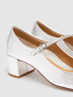 45mm Heel. Laminated leather upper. Adjustable strap with buckle closure. Square toe. Leather lining and insole. Leather sole Square Toe Shoes, Tom Ford Beauty, Silver Pumps, Ski Accessories, White Pumps, Mary Jane Pumps, Patent Leather Heels, Leather Mary Janes, Patent Leather Pumps