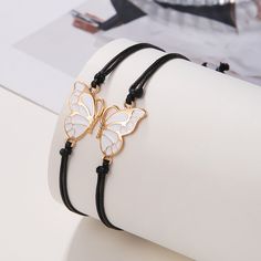 Material: Alloy Fashion Element: Butterfly Style: Simple White Alloy Bracelets For Party, White Alloy Charm Bracelet As Gift, Minimalist Adjustable Alloy Charm Bracelet, White Metal Jewelry For Friendship, Adjustable Black Alloy Bracelets, Adjustable Rose Gold Alloy Bracelet, White Adjustable Alloy Charm Bracelet, Adjustable Rose Gold Alloy Charm Bracelet, Rose Gold Alloy Charm Bracelet