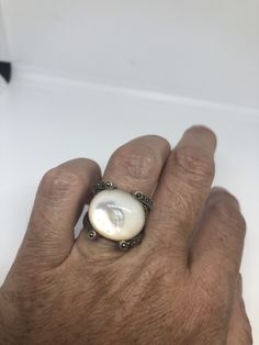 Vintage Mother of Pearl 925 Sterling Silver Marcasite Ring https://www.etsy.com/listing/633190735/vintage-mother-of-pearl-925-sterling?utm_source=crowdfire&utm_medium=api&utm_campaign=api Victorian Style Pearl Ring Gift, Victorian Pearl Ring Gift, Victorian Pearl Ring Gemstone Gift, Victorian Pearl Ring With Gemstone For Gift, Vintage Pearl Ring With Gemstone, Victorian Cabochon Pearl Ring As Gift, Victorian Style Cabochon Pearl Ring Gift, Victorian Cabochon Pearl Ring Gift, Antique White Round Pearl Ring