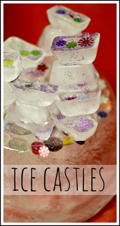 ice castles in a glass bowl with flowers on it