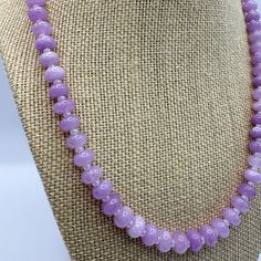 This elegant Lavender Sugar Gemstone Necklace is designed to add a touch of sophistication to any outfit. It features beautiful gemstones that exude a sense of calm and peace. Handcrafted with care, this necklace necklace commands attention, with its adjustable design perfect for layering and a vibrant pop of color to amp up any look! Spiritual Adjustable Faceted Necklace, Lavender Natural Stones Jewelry For Meditation, Adjustable Crystal Necklace With Natural Stones, Lavender Handmade Necklace For Meditation, Adjustable Crystal Necklaces With Gemstone Beads, Handmade Lavender Necklace For Meditation, Adjustable Purple Necklace, Adjustable Gemstone Rondelle Necklaces, Adjustable Purple Necklaces