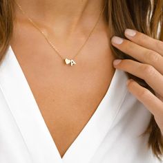 "PERSONALIZED INITIAL HEART NECKLACE Treat yourself or a friend! Our Personalized Initial Heart Necklace offers elegant style details while adding the minimalist touch of meaning to your everyday look. This dainty piece features an initial perfectly accented with a heart. ITEM SPECIFICATIONS * Finish: 925 Sterling Silver ∙ 18K Gold ∙ Rose Gold * Dimensions: Length 17\"	in stock	35.00 USD	17.50 USD	0.00 USD	Weddings > Jewelry > Necklaces
https://i.etsystatic.com/39711490/r/il/234023/4923593704/il Initial Heart Necklace, Tiny Heart Necklace, Personalized Gold Necklace, Initial Necklace Silver, Alphabet Necklace, Initial Necklace Gold, Letter Pendants, Initial Letter, Spring Sale