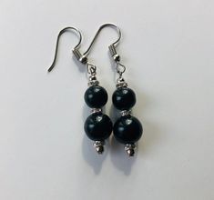 These earring make a great addition to any outfit! Made with silver hooks, silver and crystal spacers and black glass beads. Set comes in black velvet bag for storage and gifting purposes. If you like this style but would like a different color please let me know! Elegant Black Earrings With Silver Beads, Black Earrings With Silver Beads As Gift, Nickel Free Black Round Bead Earrings, Nickel-free Black Beaded Earrings For Gift, Silver Earrings With Black Round Beads, Bridesmaid Glasses, Black Earrings Dangle, Bridemaids Gifts, Casual Jewelry