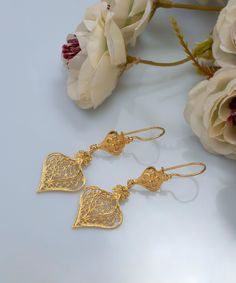 Gold Plated / 925 Sterling Silver Artisan Handcrafted Filigree Earrings Women Handmade Floral Leaf Design Jewelry Material: 925 Sterling Silver ( NICKEL FREE ) Earrings Length and Width: 2.25 Inches X 0.78 Inches FREE, FAST AND TRACKABLE SHIPPING FOR ALL EU COUNTRIES AND USA. COMES WİTH VELVET POUCH AND LUXURY GİFT BOX. These earrings are great for a dramatic everyday look. These eye catching earrings are perfect for glam. They have a round base with intricate designs going throughout. They have Silver Danglers For Gift With Elegant Design, Elegant Handmade Danglers For Celebration, Festival Filigree Danglers, Elegant Handmade Danglers For Anniversary, Elegant Earrings For Festivals And Gifts, Elegant Handmade Heart-shaped Earrings, Elegant Earrings For Gift Giving During Festivals, Elegant Filigree Danglers For Celebration, Elegant Design Earrings For Festivals