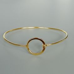 A set of sterling silver and gold plated circle of life cuff bangles. This listing is for TWO PIECES of bangles Length: 7 cms circle: 16 mm This bangle is made of 925 hypoallergenic sterling silver, one is silver and one is plated in gold. This piece is sent in a gift box. I can include a personal message from you if needed You are welcome to contact me at... bhavnakwintra1956@gmail.com For more beautiful pieces from my shop, please browse 👇 TOE RINGS: https://www.etsy.com/your/shops/TheSilverG Sterling Silver Flower Bracelet, Silver Flower Bracelet, Boho Bangle, Bangle Gold, Wrist Jewelry, Evil Eye Earrings, Sterling Silver Bangle, Silver Circle, Circle Of Life