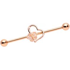 14 Gauge (1.6mm), 1 1/2" (38mm), Rose Gold Tone PVD over 316L Surgical Grade Stainless Steel Straight Barbell, Moveable Charm, Cubic Zirconia, 5mm Ball Ends 14 Gauge Clear CZ Gem Rose Gold Tone Heart Industrial Barbell 38mm Give your heart some butterfly wings with this 14 gauge helix barbell! It's made with a 1 1/2" rose gold tone PVD over 316L surgical grade stainless steel straight barbell with 5mm ball ends. It features a hollow heart charm angled to one side. On the left side of the heart i Stylized Butterfly, Rudraksha Jewelry, Piercing Industrial, Piercing Inspiration, Industrial Earrings, Industrial Piercing Jewelry, Bar Earring, Types Of Ear Piercings, Ear Piercings Helix