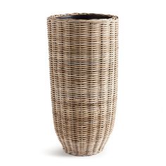 a wicker vase is shown on a white background, with the bottom half open