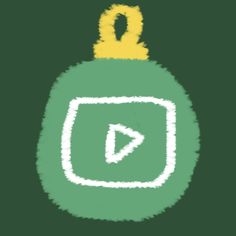 a green and yellow christmas ornament with a video play button in the center