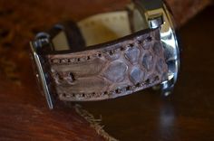 RECOMMENDATION FOR STRAP LENGTH : WRIST SIZE 15-17 CM - 115/75 MM STRAP LENGTH WRIST SIZE 17,5-19 CM - 130/80 MM STRAP LENGTH Caracteristics: Model : PYTHON - VINTAGE BROWN MATTE I Genuine PYTHON SNAKE BELLY LEATHER Color : BROWN Matte Handmade Spain ONLY VALID FOR TANG BUCKLE (PHOTOS) Width : 26/24/22 mm (at the watch) - 26/24/22 mm (at the buckle) Length : 130 / 80 mm - 115 / 75 mm Thickness : aprox. 3,5 mm Edges : PAINTED Keeper : 1 fix + 1 floating Inox. tubes included (Width 26 + 24 mm) Wat Luxury Brown Watch Accessories With Waxed Finish, Vintage Brown Wrist Strap For Watches, Vintage Brown Wrist Strap Watch Accessories, Classic Handmade Adjustable Watch Band, Vintage Brown Watch Accessories With Wrist Strap, Brown Leather Strap Watch Band As Gift, Brown Leather Bracelet With Palladium Hardware, Vintage Brown Leather Strap Watch Band, Vintage Brown Adjustable Watch Band