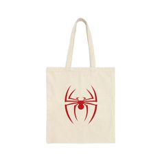 Introducing our Red Spider Tote Bag - A spooky and stylish bag, a bold and captivating accessory that effortlessly blends fashion-forward design with functionality. This striking tote bag is perfect for those who appreciate unique, eye-catching accessories that make a statement. Add a little bit of Halloween touch and creepiness to your outfit. Design: The Red Spider Tote Bag is a true masterpiece, that serves as the perfect canvas for a stunning spider web pattern. The spider, a symbol of creat Spiderman Tote Bag, Spider Web Pattern, Web Pattern, Canvas Bag Design, Red Spider, Web Patterns, Red Tote Bag, Men's Totes, Red Tote