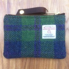 Excellent Valentines day gift Harris Tweed coin purse, coin pouch or USB/gadget case. This little coin pouch has a pleather lining and a strong leather pull. Its bright colour means less searching for your change or makes it easy to carry your phone charger without it strangling everything in your bag! You might want to use it for golf tees or whatever you like. The perfect womens wallet. It will take keys, cards and coins. Tartan Cushions, Green Wallet, Tweed Purse, Plaid Purse, Tweed Bag, Gadget Case, Plaid Tote, Money Pouch, Womens Wallet