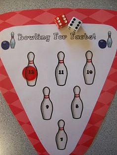 a red and white sign with bowling pins on it