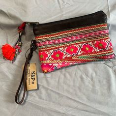 I Bought This Wallet While Traveling In Thailand, It Still Has Its Store Tag On It. I Never Used It So It’s In Unused Condition. The Leather Trim Is Unmarked And The Brocade Fabric Is Clean And In Tact. It’s A Super Cute Wristlet. 8,5”L X 5.5”W X .5”D 7” Wristlet Strap, Which Is Removable Pink Pouch Wristlet With Strap, Pink Pouch Clutch With Wrist Strap, Pink Pouch Wristlet With Wrist Strap, Pink Clutch With Wrist Strap, Pink Bohemian Clutch For Everyday Use, Pink Pouch Wallet With Wrist Strap, Pink Clutch Wallet With Wrist Strap, Pink Wristlet For Daily Use, Pink Wristlet With Wrist Strap For Daily Use