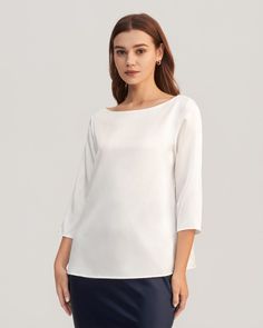 Simple yet elegant, the 3/4 Sleeve Boat Neck Silk Top is made from soft, skin-friendly silk with a hint of stretch to ensure you feel comfortable at all times. When you need to look good quickly with minimal effort, look to this top to solve your problem. The chic boat neck is the epitome of class and will be sure to flatter you. Stand Collar Blouse, Boat Neck Blouse, Silk Tee, Bow Tie Blouse, Shirt Blouses Women's, Elegant Scarves, Printed Silk Blouses, Tie Blouse, Big Fashion