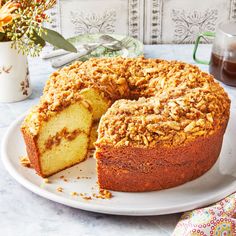 a cake on a plate with a slice cut out