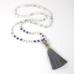 Long Tassel Beaded Necklace with White Howlite and Lapis Lazuli White Beaded Necklaces With Tassels As Gift, White Beaded Necklaces With Tassels For Gift, White Beaded Tassel Necklaces As Gift, White Long Tassel Necklace As Gift, Adjustable White Tassel Necklace Gift, Beaded Tassel Necklace, Necklace Ideas, Decorative Beads, Drop Pendant Necklace