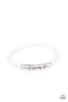 Stamped in heartbeats and the word, "Family," a shiny silver plate attaches to a strand of white cat's eye stone beads that are threaded along a stretchy band, creating a whimsically sentimental centerpiece around the wrist.

Sold as one individual bracelet. Family Is Forever, Family Bracelet, Family Bracelets, Families Are Forever, White Bracelet, Word Family, Cats Eye Stone, Inspirational Bracelets, Jewelry Catalog