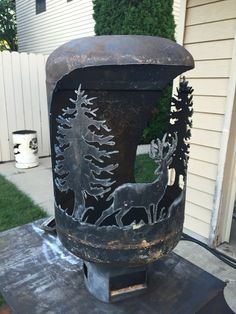 an old fire hydrant sitting in front of a house