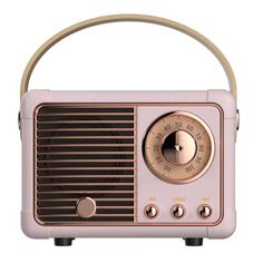 an old fashioned radio with a wooden handle