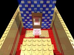 the interior of a building made out of legos and blocks is shown in red, white, and blue