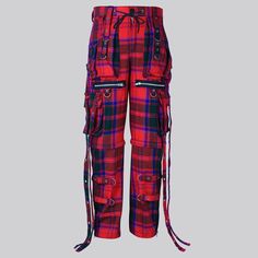 Discover Your Inner Highlander with the Clan Grant Modern Tartan Gothic Trousers: Experience the perfect blend of tradition, comfort, and edgy flair with the Clan Grant Modern Tartan Gothic Trouser X Strap Pant and Short from Skotsk. More than just clothing, this is a fashion statement for men and women who love to stand out. Make a Statement: Vibrant Clan Grant Tartan: Add a touch of Scottish heritage with a contemporary twist, letting your unique personality shine through. Versatile X-Strap Design: Switch between full-length trousers and trendy shorts effortlessly for different looks and occasions. For Everyone: Unisex Style: Breaking traditional fashion norms, these trousers are made to flatter both men and women, allowing everyone to express themselves. Ready for Anything: Sturdy 16oz Red Punk Style Pants For Streetwear, Red Punk Pants For Streetwear, Red Punk Bottoms With Belt Loops, Tartan Trousers, Red Punk Style Bottoms For Alternative Fashion, Red Punk Bottoms For Alternative Fashion, Gothic Red Bottoms For Fall, Gothic Red Bottoms For Alternative Fashion, Red Festival Bottoms With Pockets