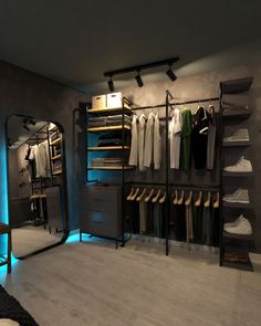 a walk in closet filled with lots of clothes